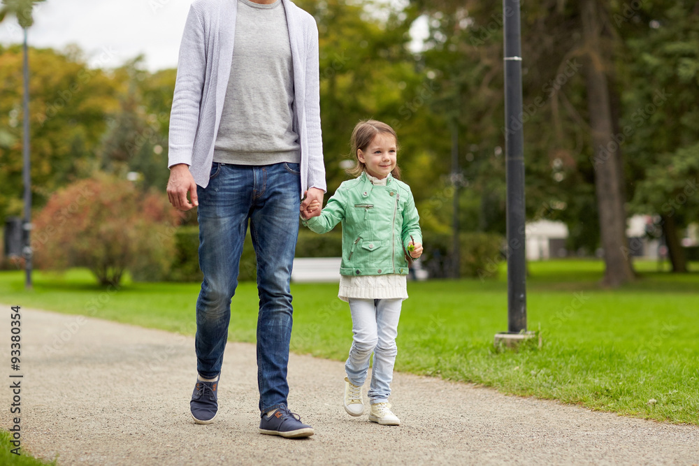 happy family walking in summer park