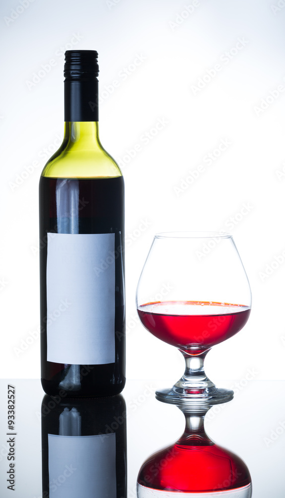 bottle of red wine and wine glass bottle of red wine and wine glass