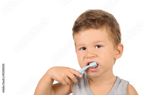 Boy brushing teeth