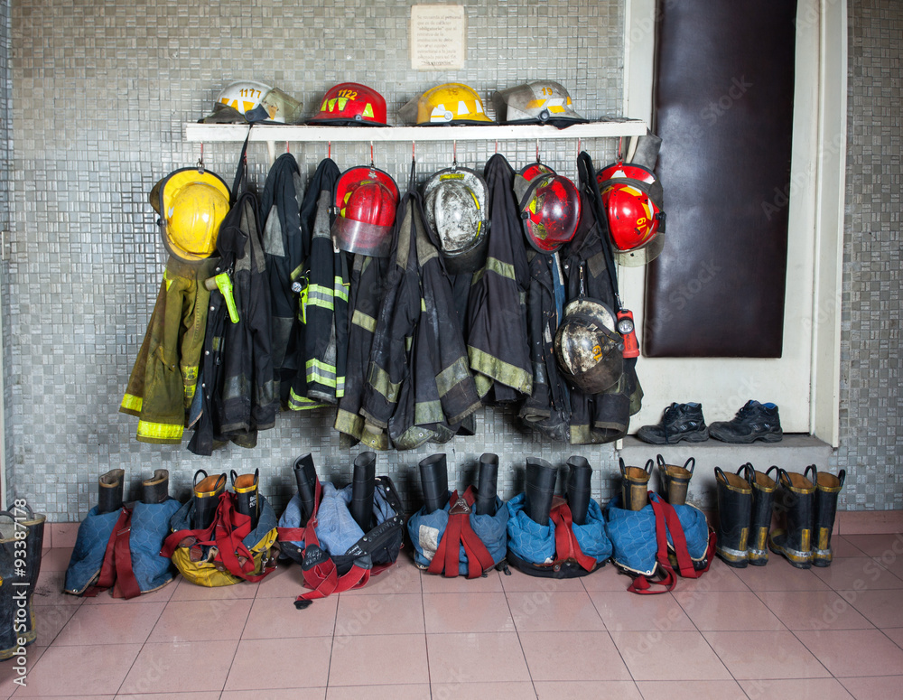 Fototapeta premium Firefighter Suits Arranged At Fire Station