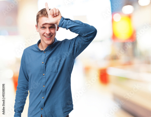 Schilderij op canvas happy young-man looser sign