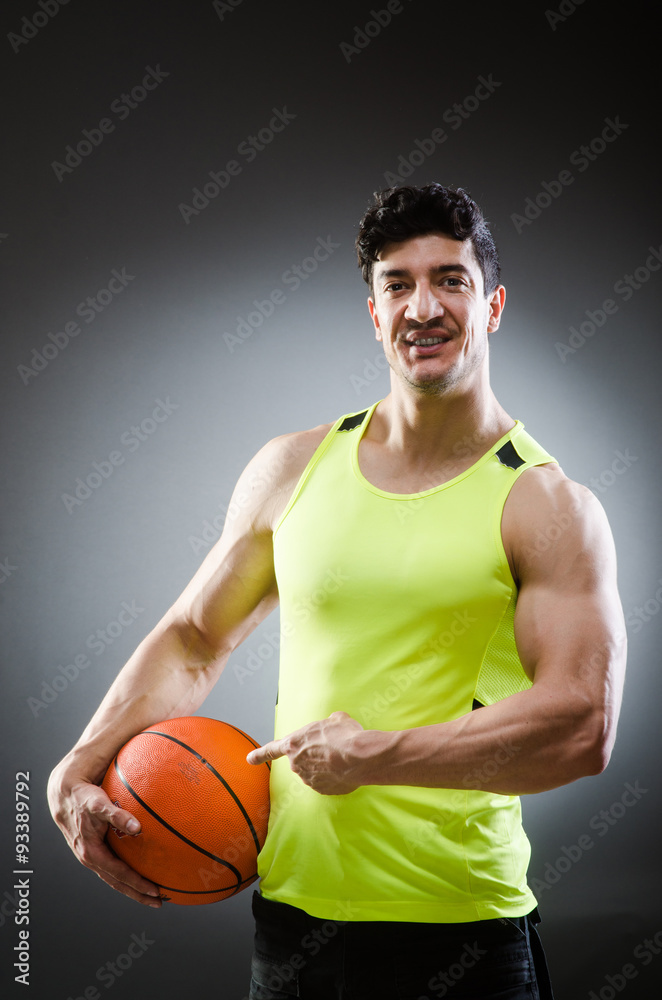 Muscular basketball in sports concept Muscular basketball in sports concept