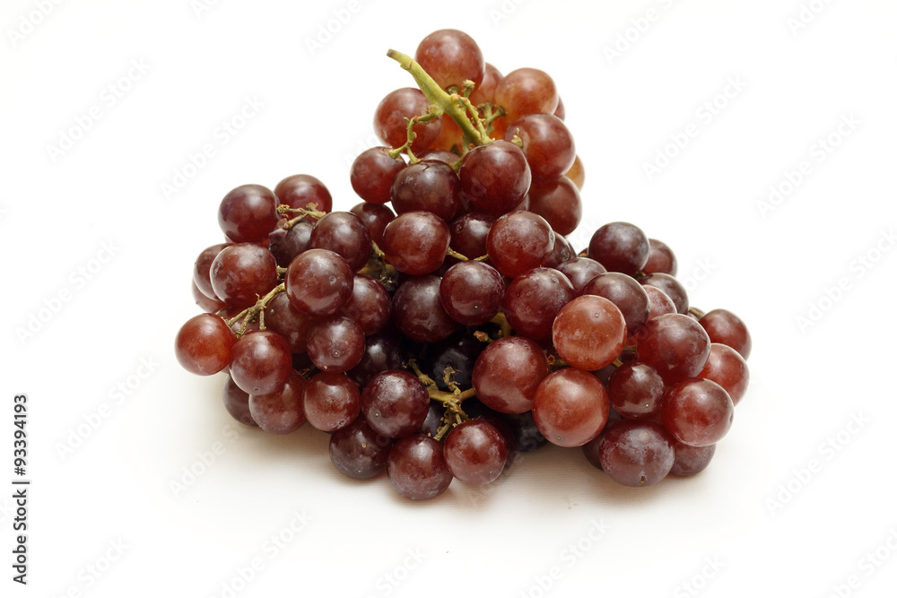 Fototapeta premium Bunch of red grapes isolated on white background.