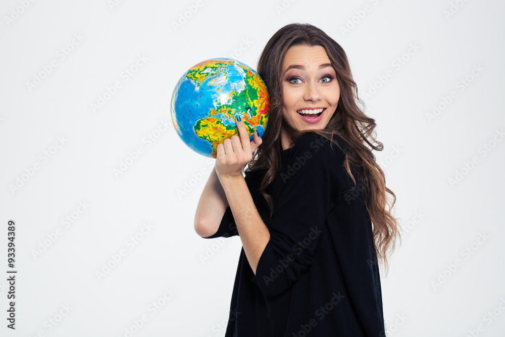 Cheerful woman holding globe and looking at camera Cheerful woman holding globe and looking at camera