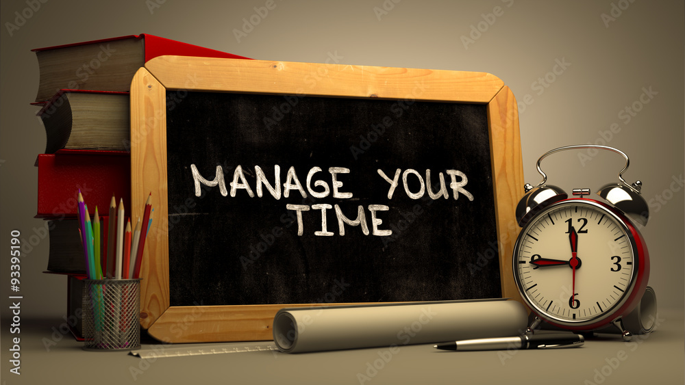 Handwritten Manage Your Time on a Chalkboard. Handwritten Manage Your Time on a Chalkboard.