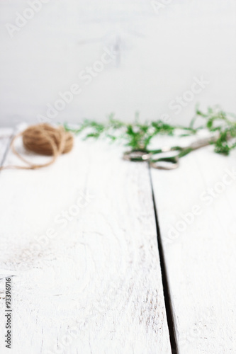 Mix of herbs on a wooden table with copy space