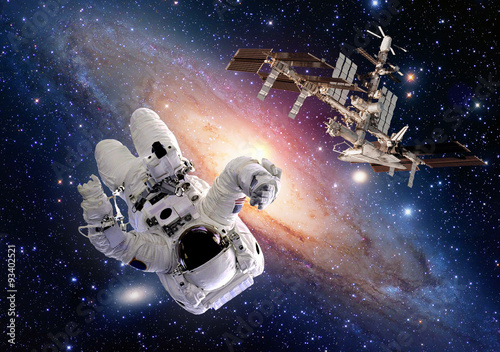 Astronaut spaceman sci fi outer space shuttle station spaceship. Elements of this image furnished by NASA.