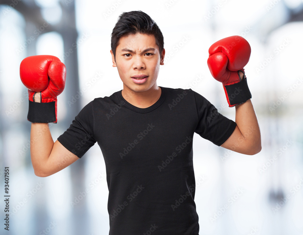 happy chinese sport man with boxing gloves happy chinese sport man with boxing gloves