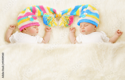 Twins Babies Sleep in Hat, Newborn Kids Sleeping, Cute New Born photo