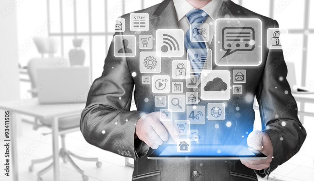 Business man using tablet PC with social media icon set Business man using tablet PC with social media icon set