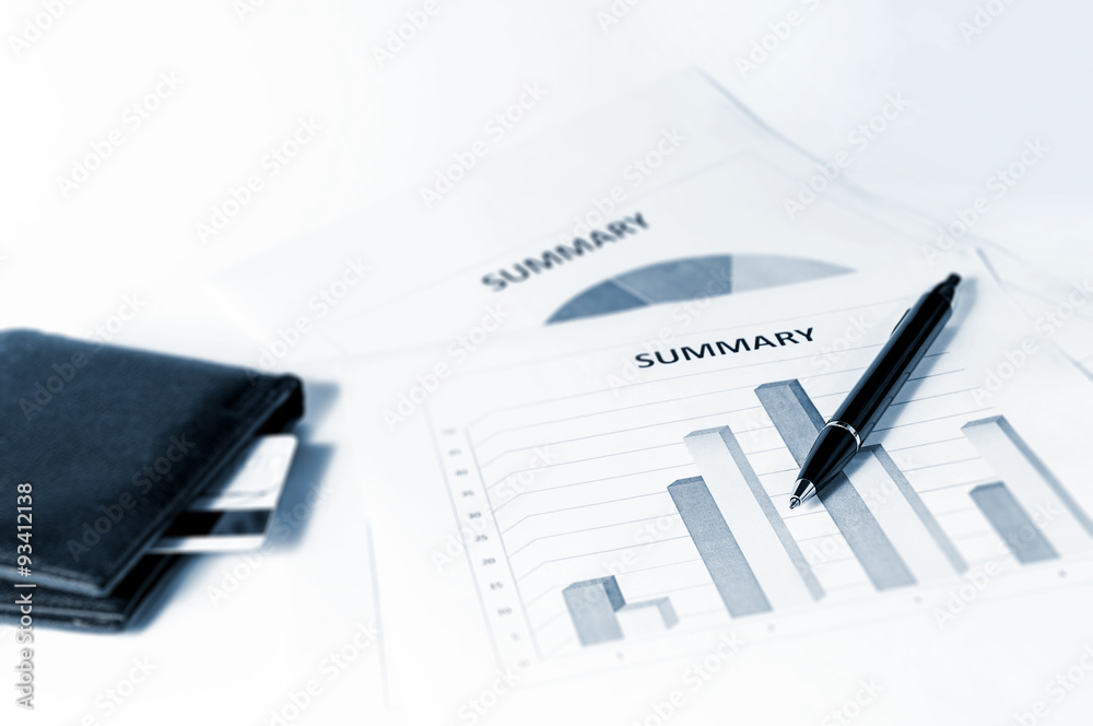 Financial Graphics, Pen And Wallet. Blue Tint Financial Graphics, Pen And Wallet. Blue Tint