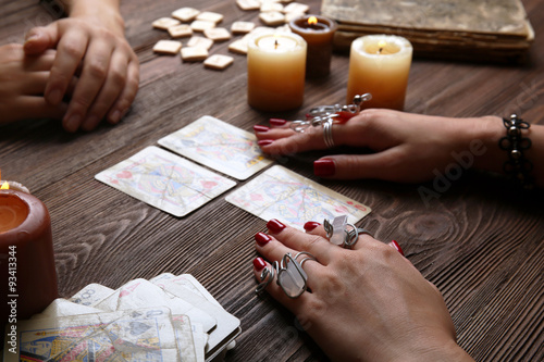 Witch - fortune teller reading fortune close up photo