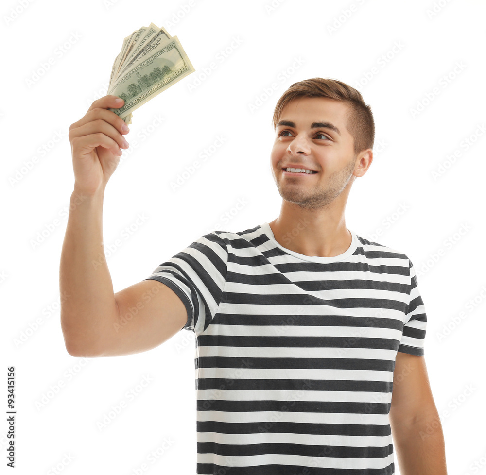 Handsome young man holding money isolated on white Handsome young man holding money isolated on white