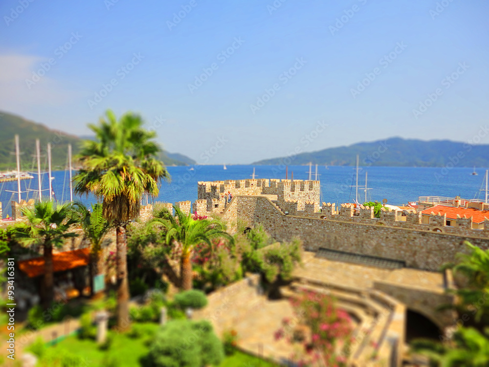 Medieval fortress by sea, selective focus, tilt-shift effect