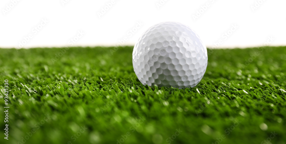 Golf ball on grass isolated on white Golf ball on grass isolated on white