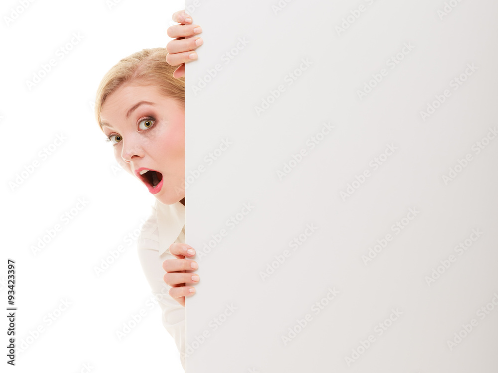 Businesswoman hiding behind blank copy space banner Businesswoman hiding behind blank copy space banner