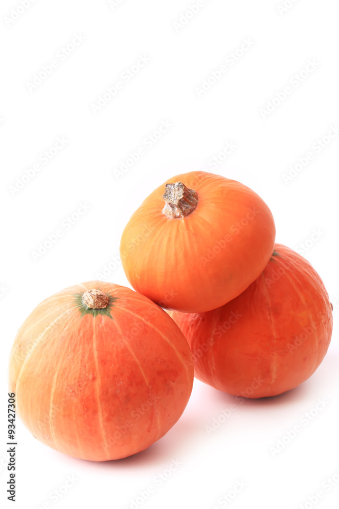 Obraz premium three pumpkins isolated on a white background