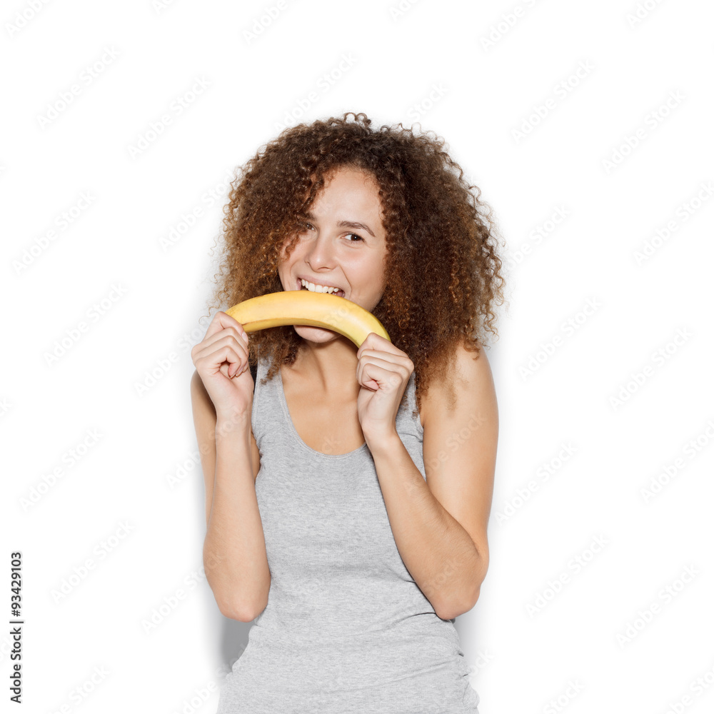 Young pretty woman making fun with banana Young pretty woman making fun with banana