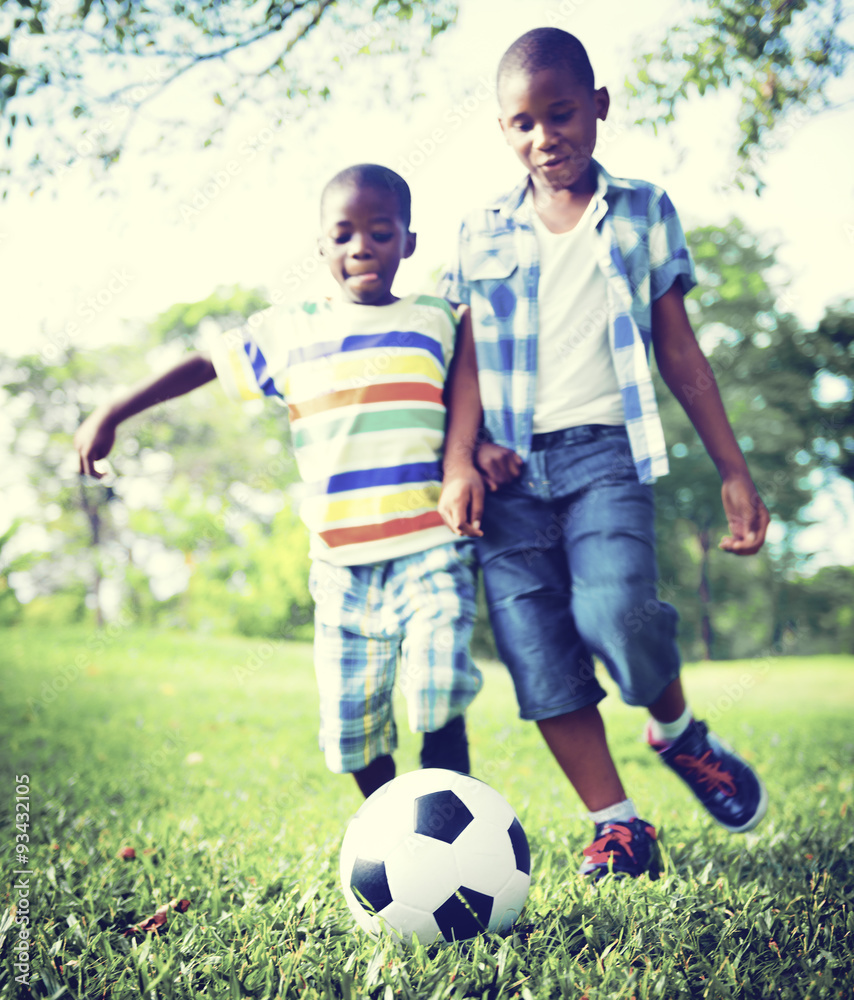 Fototapeta premium African Children Playing Exercise Football Concept