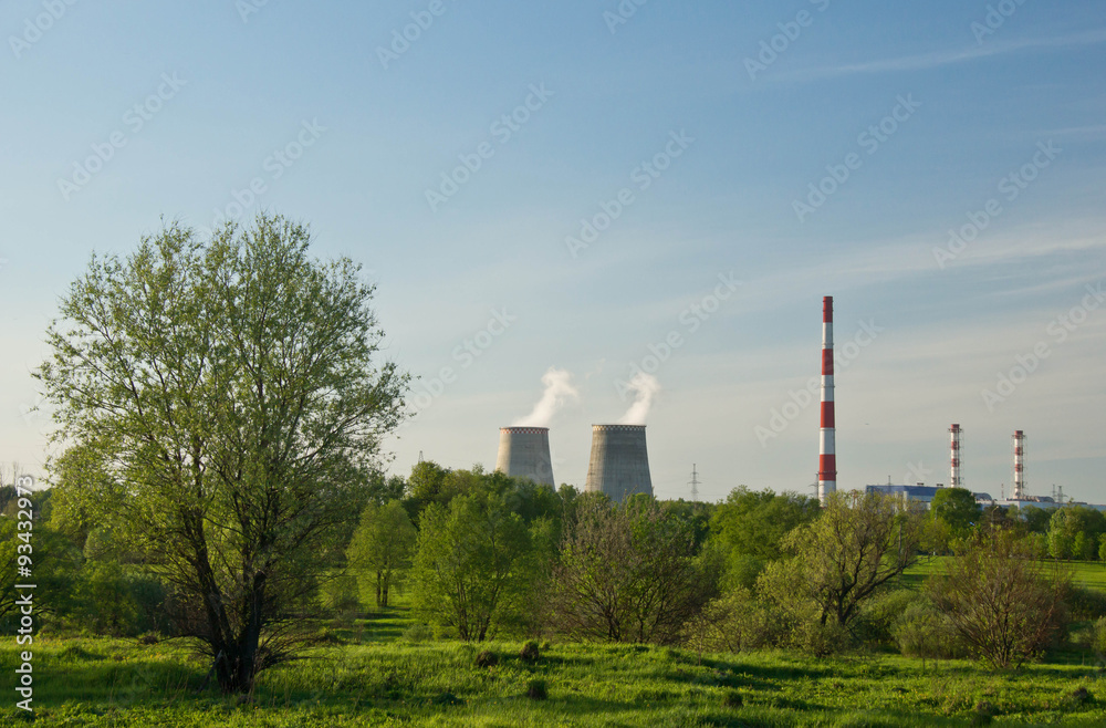 power plant in sunny summer wood