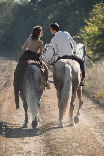 Romantic couple riding  © Andriy Bezuglov