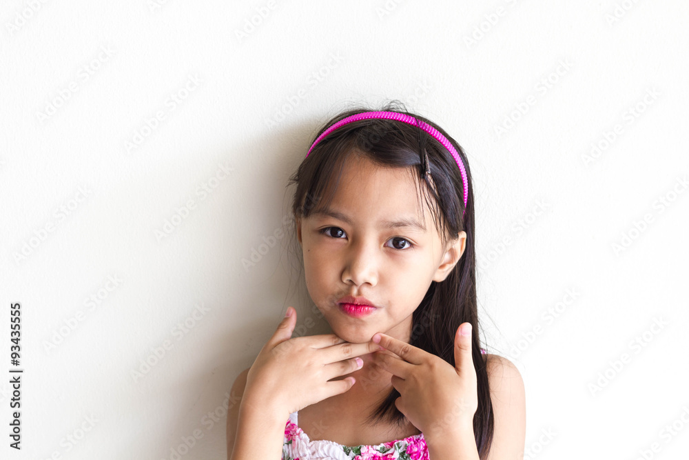 Beautiful little asian girl isolated in white Beautiful little asian girl isolated in white