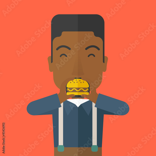 Man eating hamburger. 