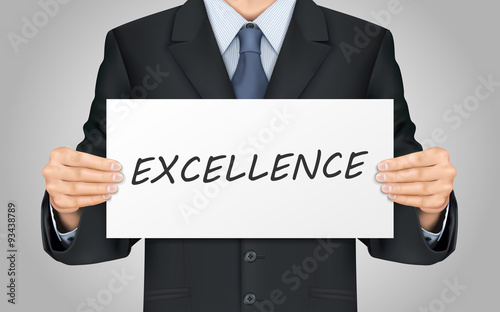 businessman holding excellence poster