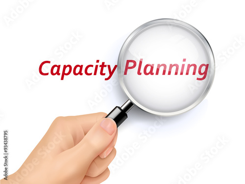 capacity planning words showing through magnifying glass
