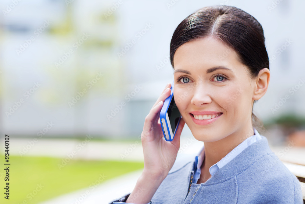 young smiling businesswoman calling on smartphone young smiling businesswoman calling on smartphone