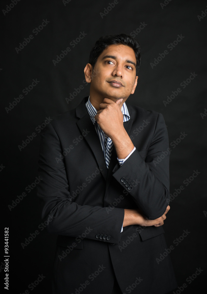 indian business male with black background indian business male with black background