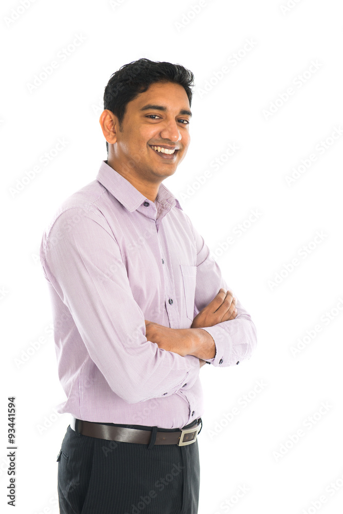 Full length portrait of smiling businessman standing arms crosse Full length portrait of smiling businessman standing arms crosse