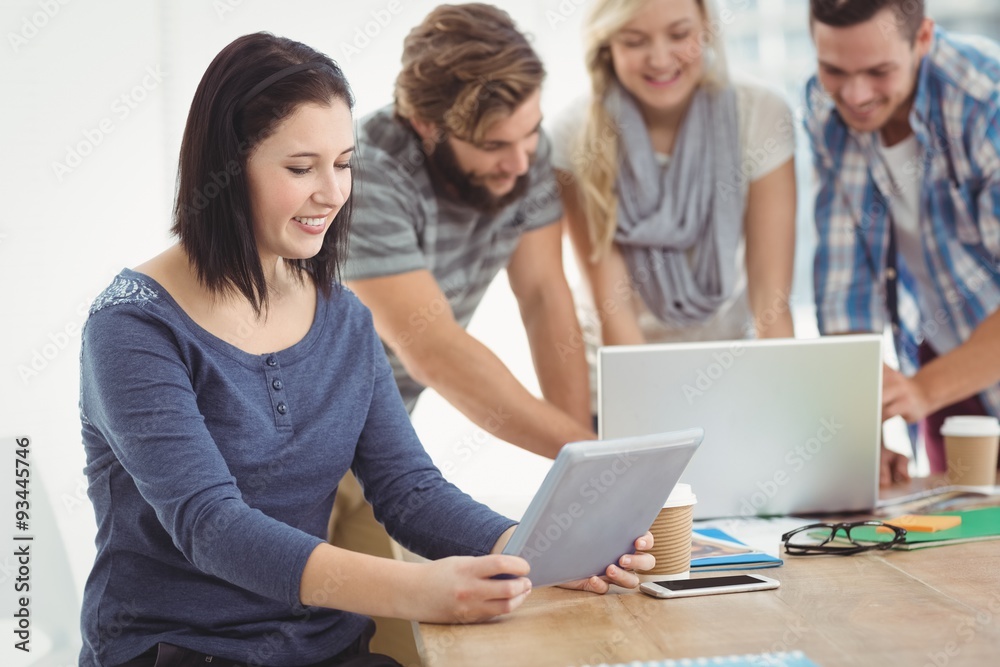 Smiling businesswoman holding tablet Smiling businesswoman holding tablet