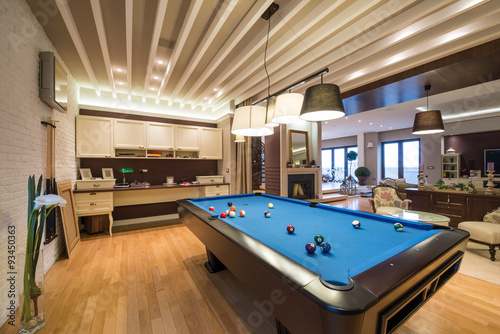Interior of a luxury living room with pool table © interiorphoto