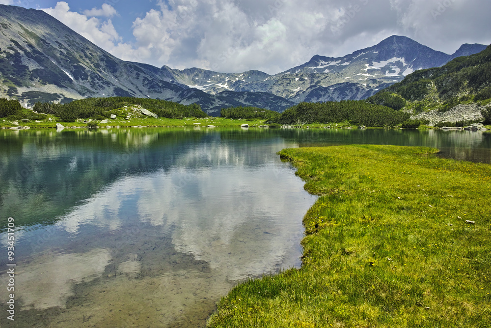 Reflection of Banderishki chukar peak in Muratovo lake, Pirin Mountain, Bulgaria