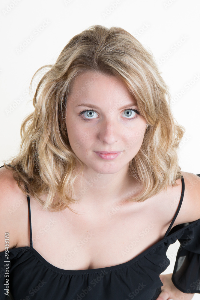 Beautiful young blond woman with blanck and white clothes Beautiful young blond woman with blanck and white clothes
