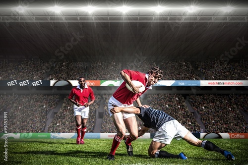 Composite image of rugby fans in arena