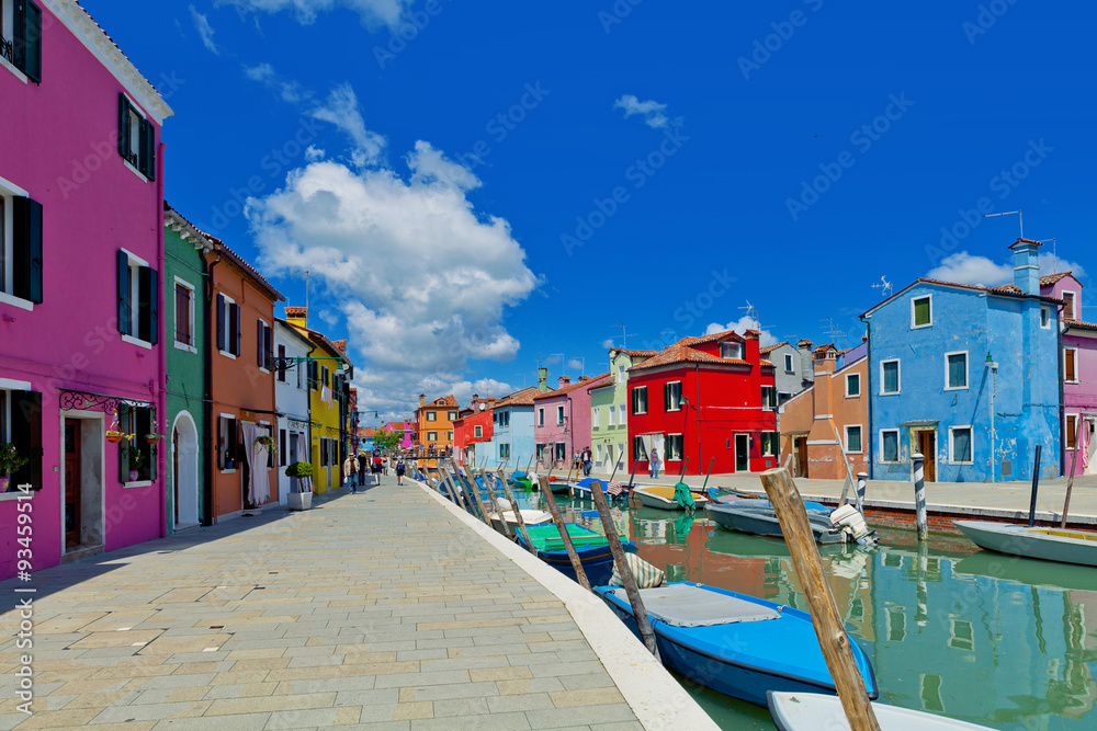 Venice landmark, Burano island, colorful houses and boats, Venice, Italy