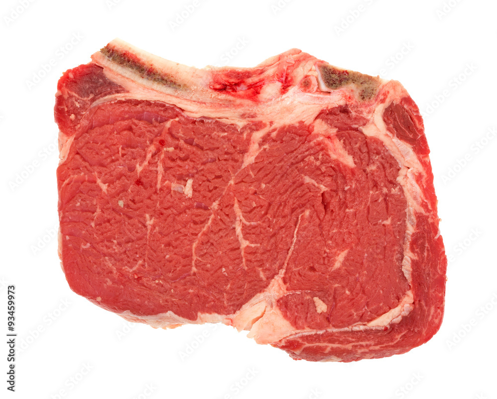 Bone in rib eye steak on a white background Bone in rib eye steak on a white background
