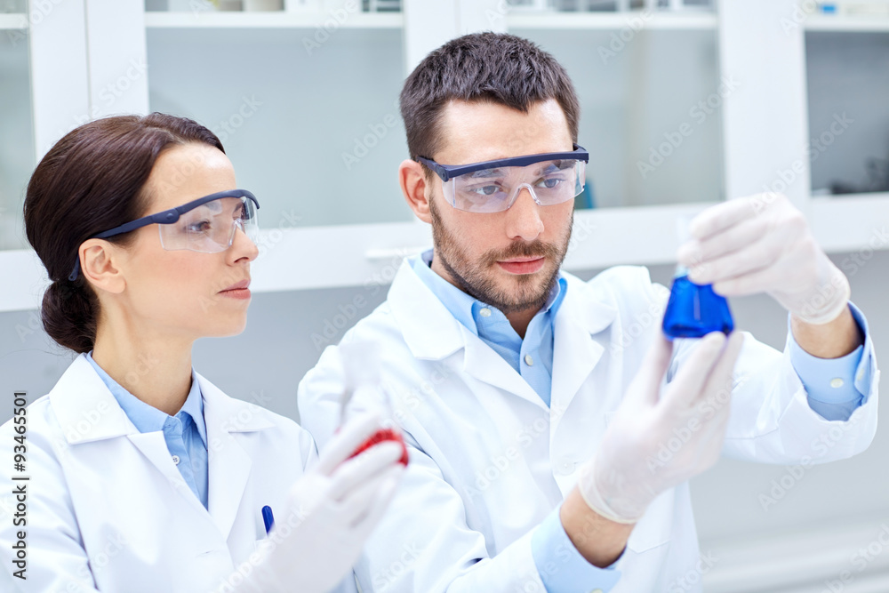 young scientists making test or research in lab young scientists making test or research in lab