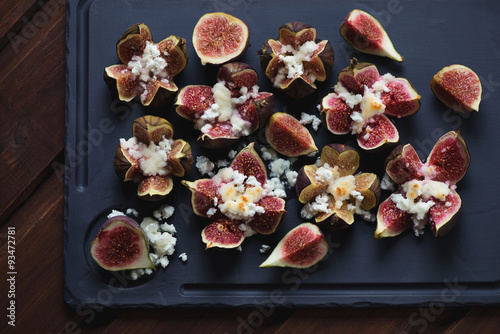 Top view of fig fruits baked with cottage cheese and honey