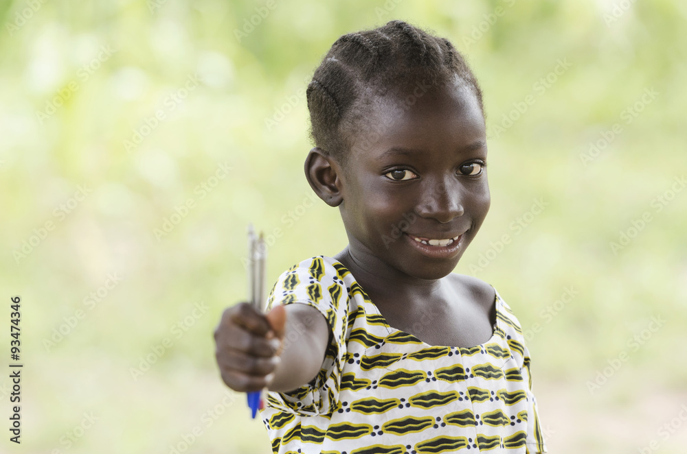 Education symbol: little African black teenage girl holding pen in the air lightly smiling to the camera. African children need education since it is the most important thing for a better future. Education symbol: little African black teenage girl holding pen in the air lightly smiling to the camera. African children need education since it is the most important thing for a better future.