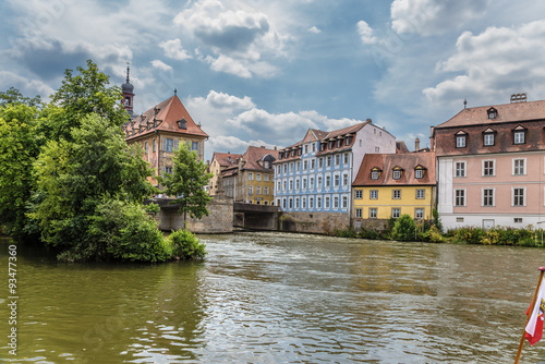 Bamberg. A scenic view of the Regnitz river with the Old Town Hall and the old buildings on the left bank