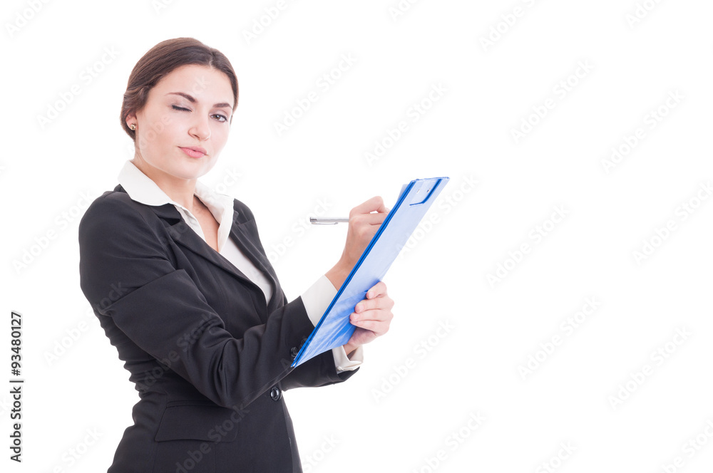 Sexy and young woman supervisor writing on clipboard Sexy and young woman supervisor writing on clipboard
