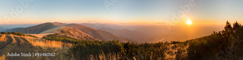 Leinwand Poster Panorama of amazing sunrise on mountain ridge