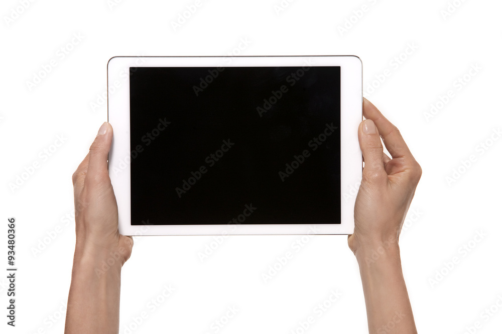 Tablet in hands. Studio shot isolated on white. Tablet in hands. Studio shot isolated on white.