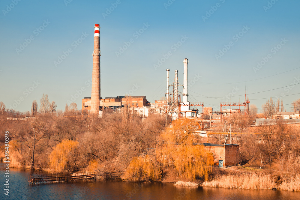Old thermoelectric power station on the river