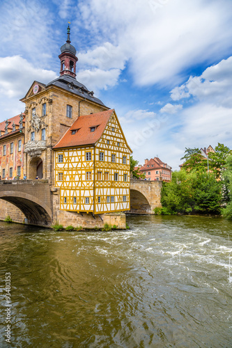 Bamberg, Germany. Old Town Hall (1461), half-timbered "corporal House" (1668) and the Upper Bridge (1453). Historic city center of Bamberg is a listed UNESCO world heritage site