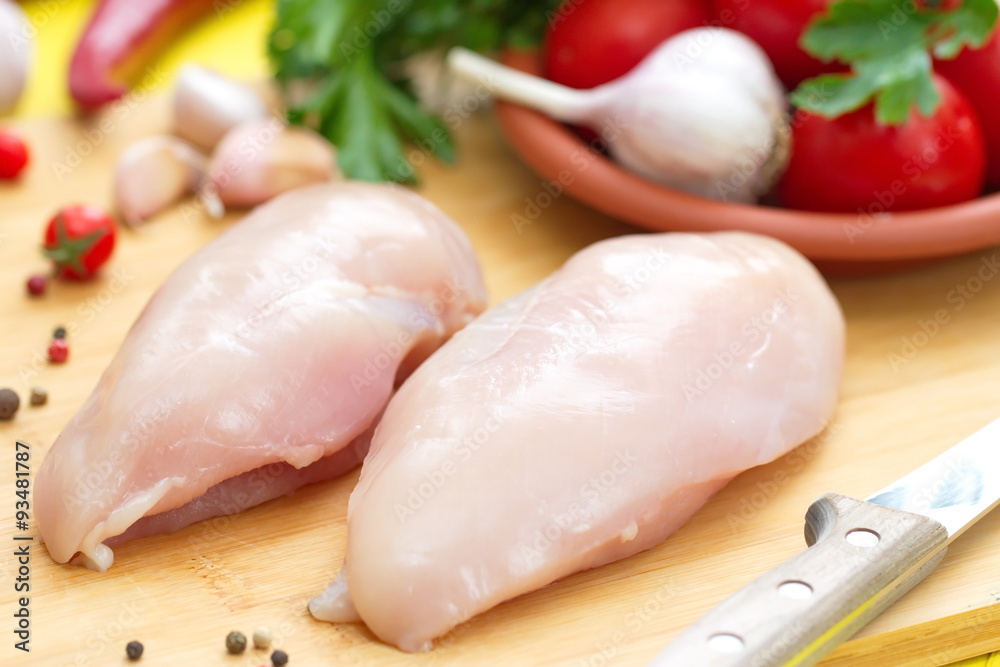 Raw chicken fillet with vegetables prepared for cooking