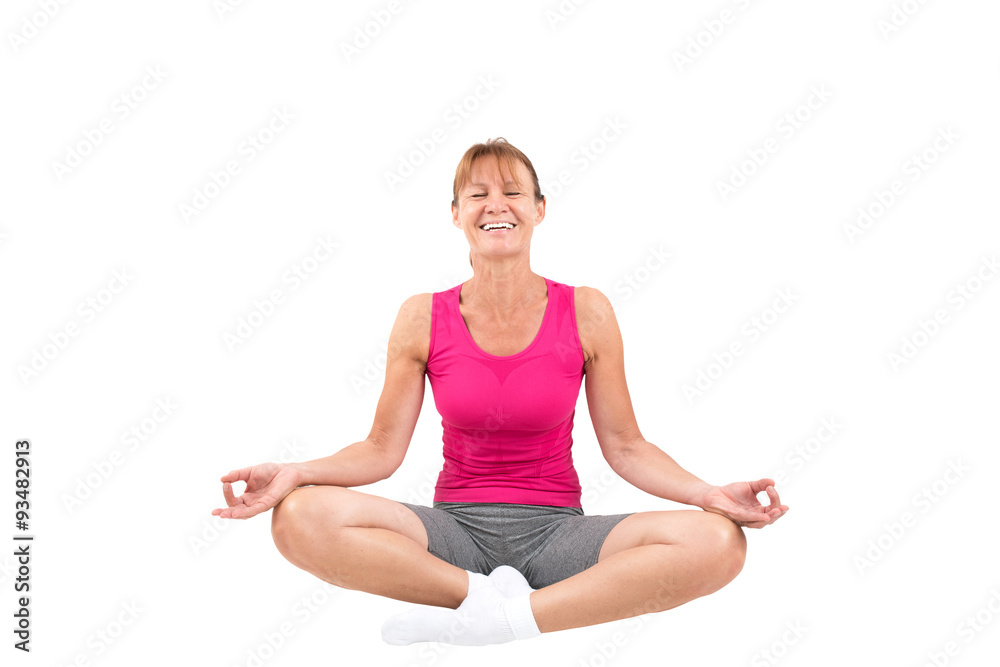 Sporty woman meditating and laughing